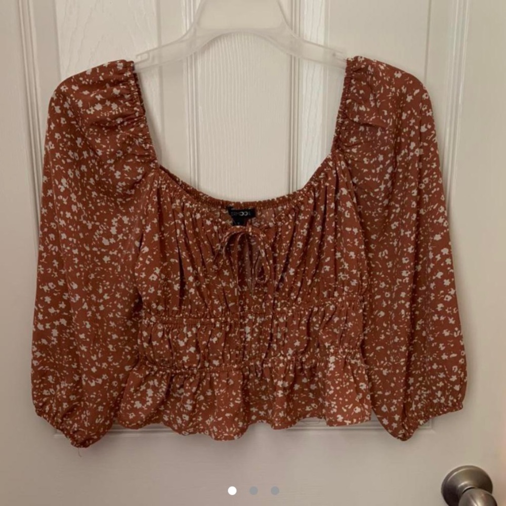 Women’s orange flower blouse